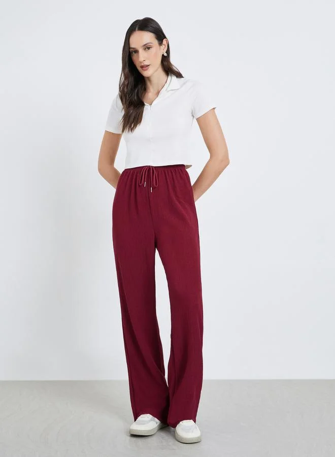 Styli Women Burgundy Textured Drawstring Pants